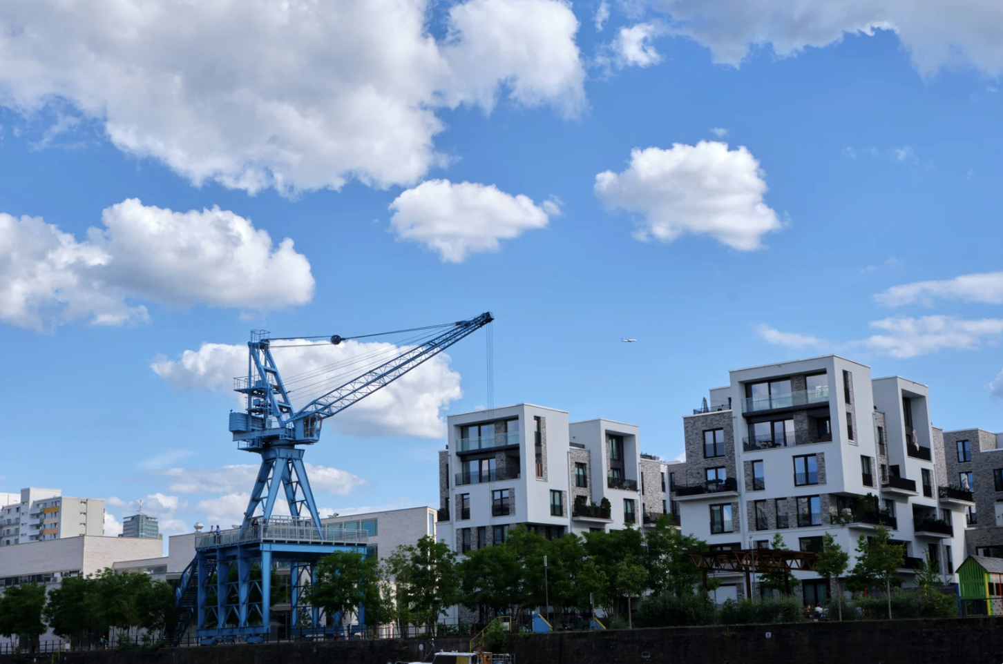 Towering Building and Construction Cranes at Work.