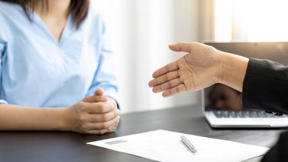 Hand extended for a property deal.