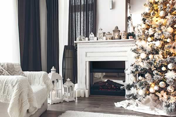 Fireplace with holiday decorations for holiday home selling.