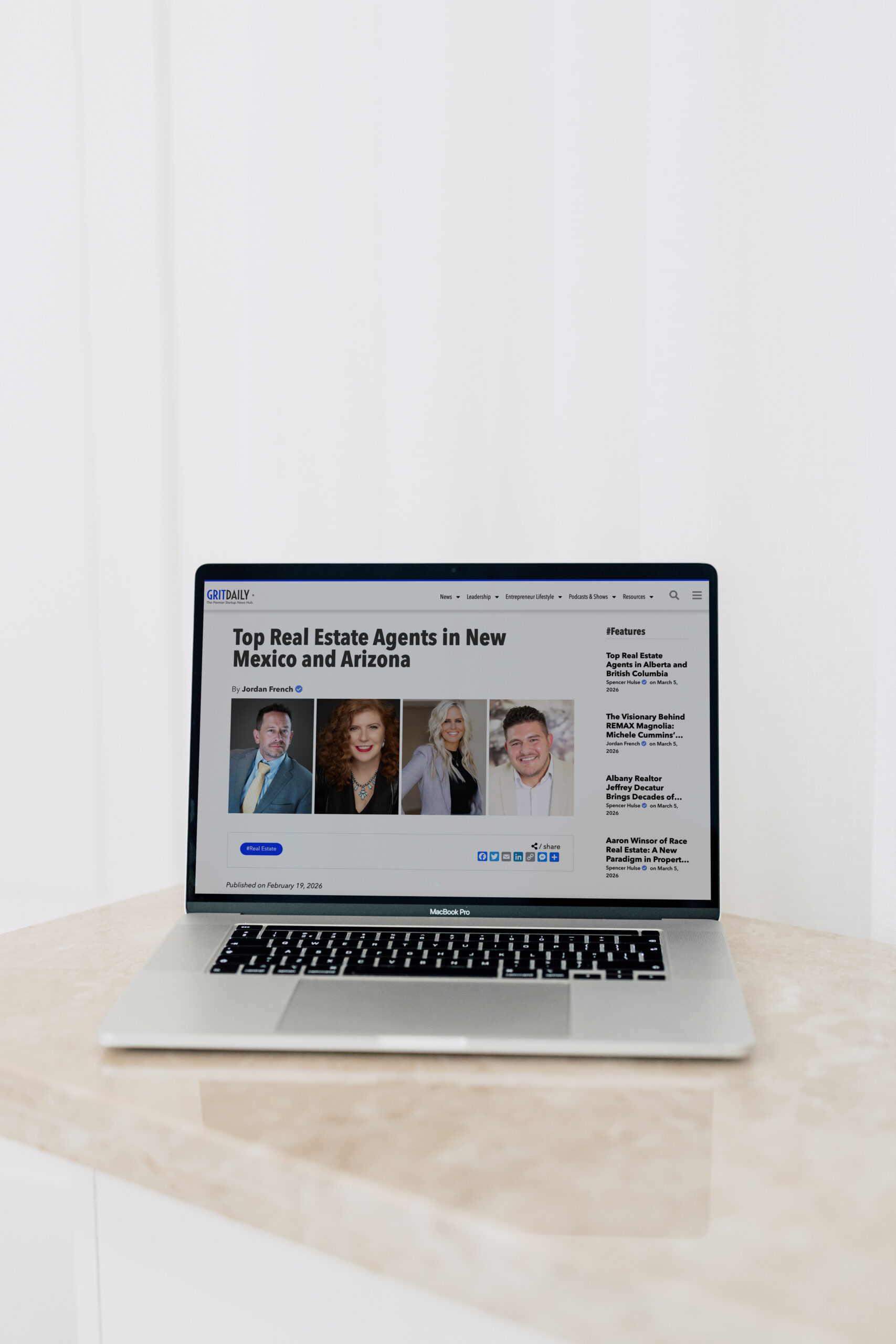 Laptop with article about Rene Kessel named Top Real Estate Agent in Albuquerque 2026