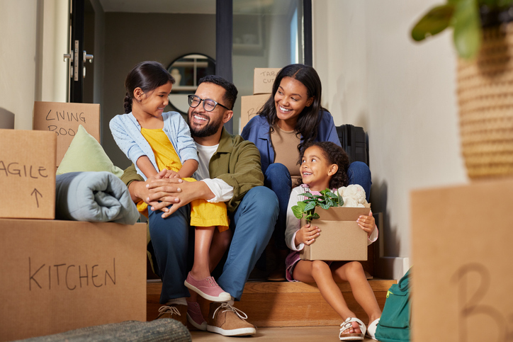 A happy family moving into their new home in Albuquerque.